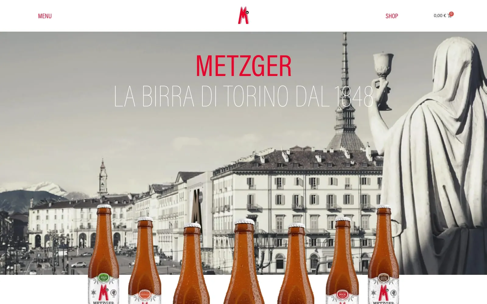 Home page di metzger1848.com: le bottiglie davanti allo skyline di Torino